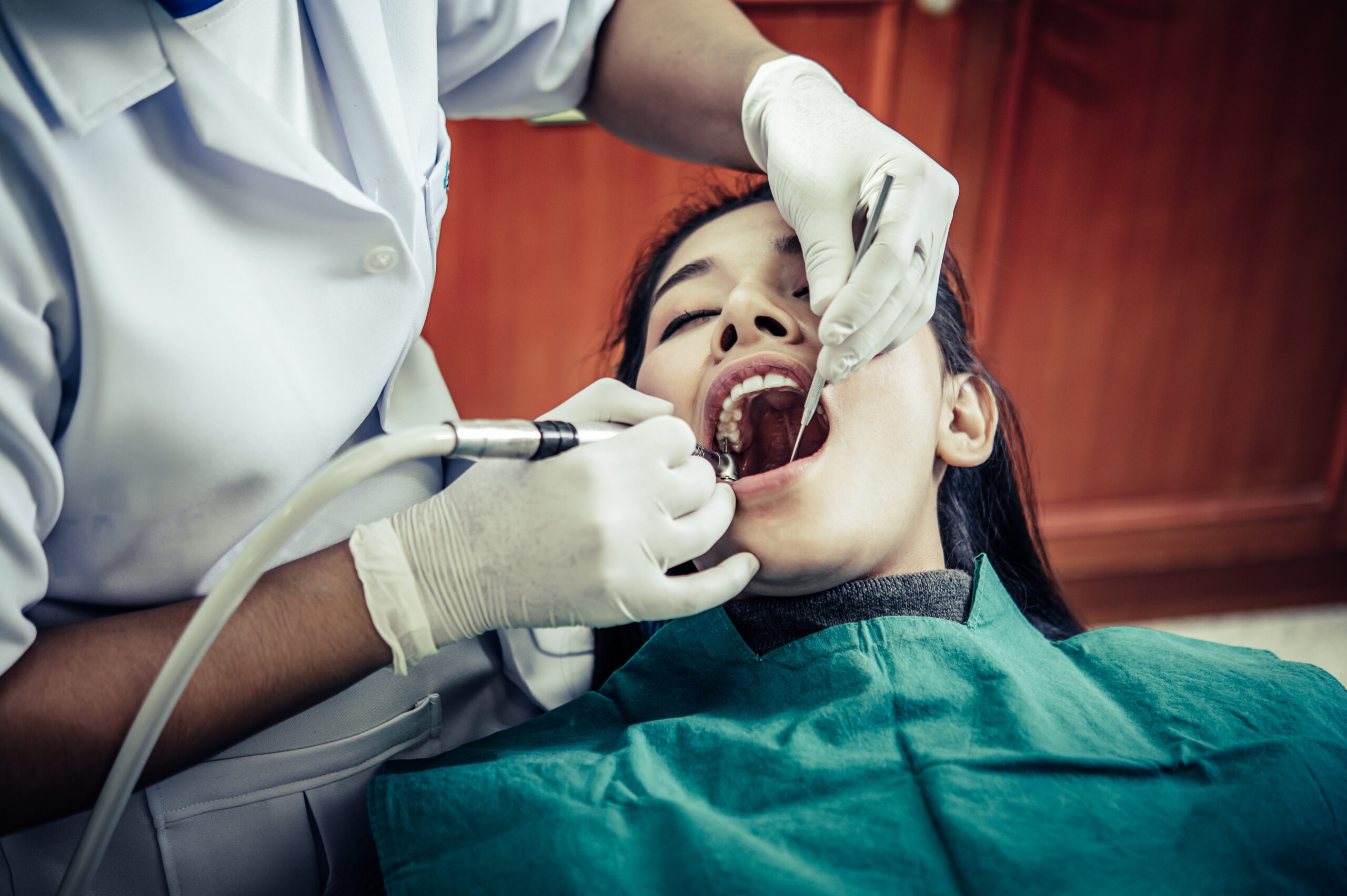 dentists treat patients' teeth.